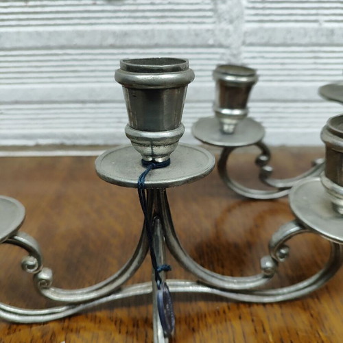 Pewter pair of three-arm candlesticks like new