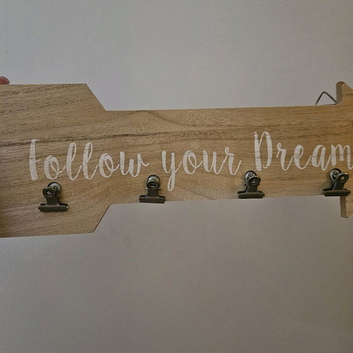 Wooden wall decor with 4 clips like new