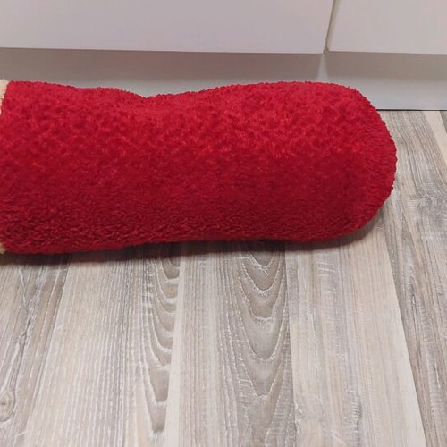 Decorative pillow used, approximately 13×45 cm