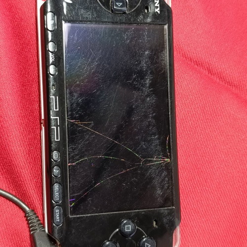 Sony PSP 3004 handheld console used, for parts or repair