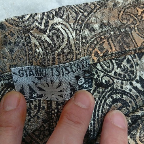 Patterned pants size S with gold designs