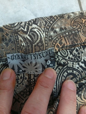 Patterned pants size S with gold designs