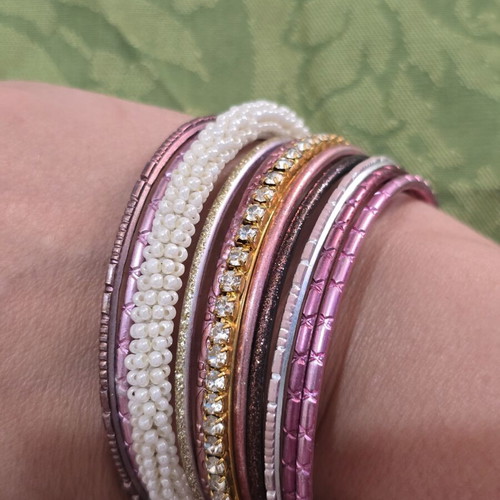 Bracelets new, pink and multicolor, all together