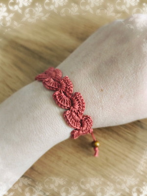 Handmade knitted bracelet made to order in rotten apple color