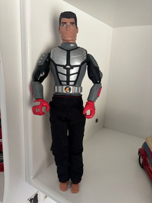 Doll used in good condition with minor wear