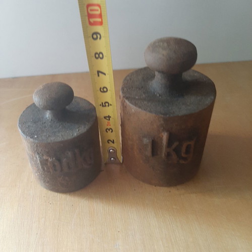 Cast iron weights used, set of 1 kg and 0.5 kg