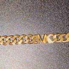 Michael Kors necklace new, gold plated with zircon