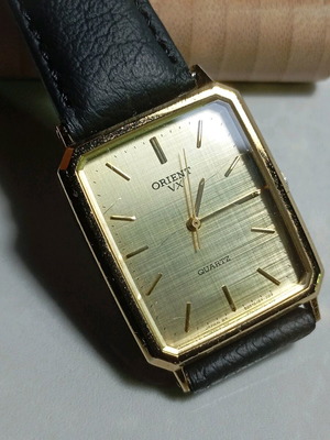 Vintage Orient VX Quartz watch used, gold color