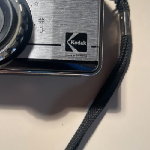Kodak Instamatic 177X camera used, with Kodar lens and strap