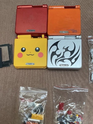 Game Boy Advance SP shells and parts used, custom project pack