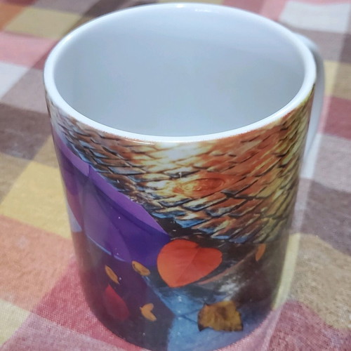 Coffee mugs used, set of 4 with designs and Nava brand