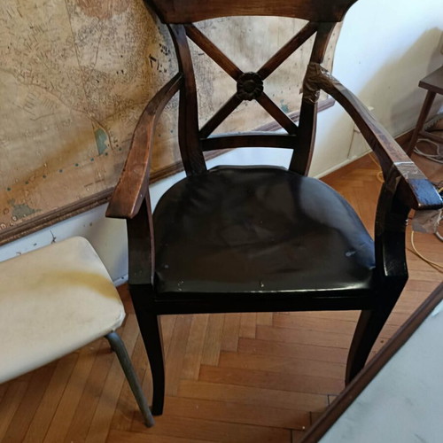 Wooden armchair used with leatherette seat and decorative back