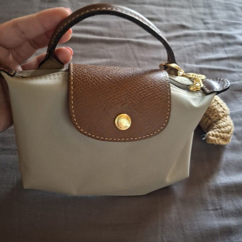 Longchamp handbag like new, gray with bag charm