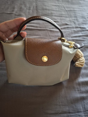 Longchamp handbag like new, gray with bag charm
