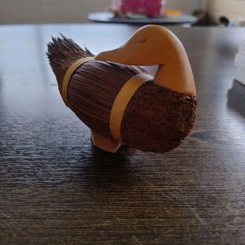 Handmade wooden duck woven from reeds, like new