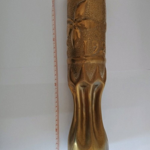 Bronze carved shell casing like new