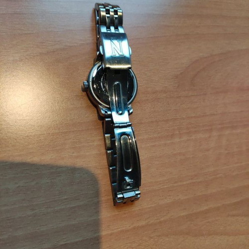 Nautica women's quartz watch with blue dial and stainless steel bracelet used