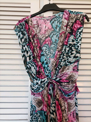 Colorful dress used, size medium to large, with belt