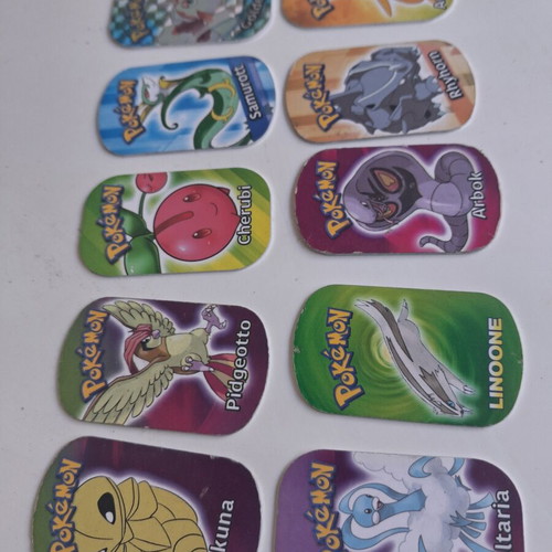 Pokemon metal tags used, set of 10 from 2006