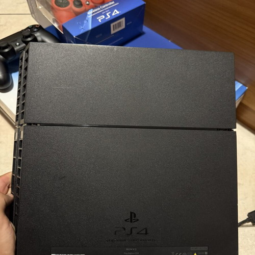 Sony PlayStation 4 500GB console like new with 2 controllers and 3 games