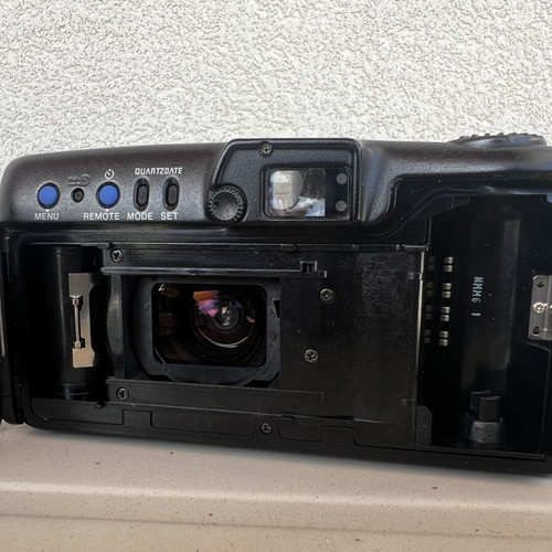 Olympus Super Zoom and Nikon Zoom Touch 600 cameras used