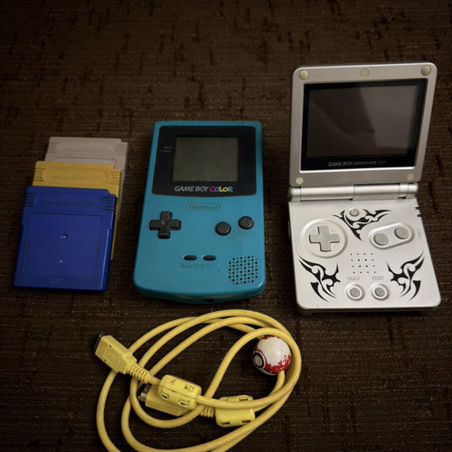 Game Boy Color, Game Boy SP Tribal Edition, Pokemon Blue and Gold games, Pikachu link cable, Battle Arena Toshinden cartridges set