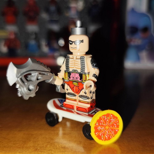 Krang figure like new with white skateboard, pizza, blade