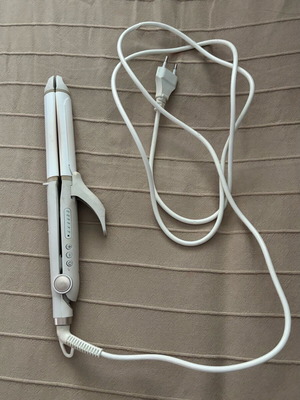 Izzy hair straightener and curler used