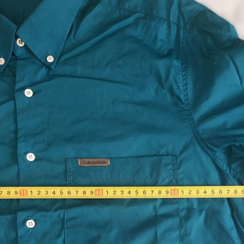 Calvin Klein shirt dark green size L like new