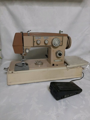 Shuttle electric sewing machine used