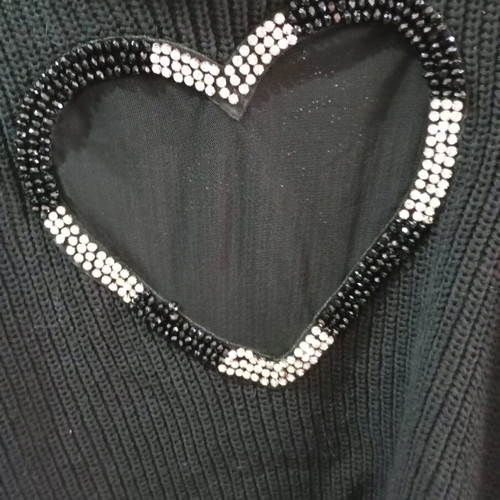 Knitted turtleneck size XS like new with rhinestones and decorative heart