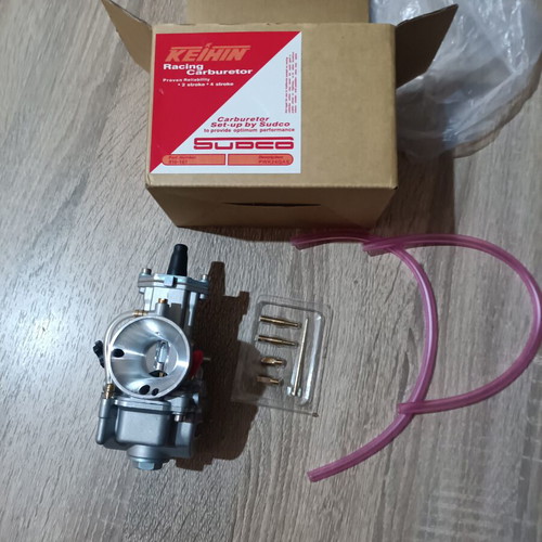 Carburetor 24mm new with extra needle, jet, neck, screws, and rubber mouth