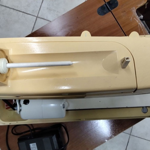 Singer sewing machine used, portable with frame damages