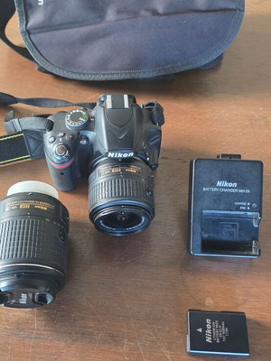 Nikon D3200 DSLR camera used with 2 Nikon VR lenses and accessories