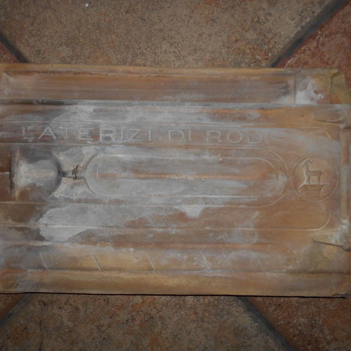 Ceramic roof tile used with ''Laterizi di Rodi'' mark and deer