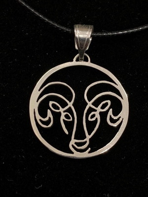 Handmade silver Aries symbol