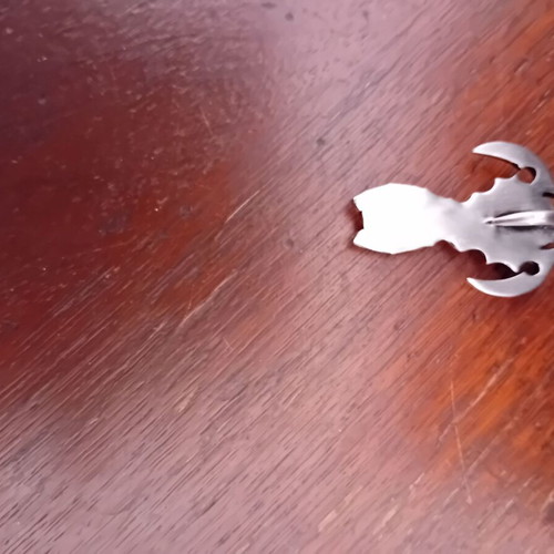 Pendant Haros with two sickles steel like new, silver