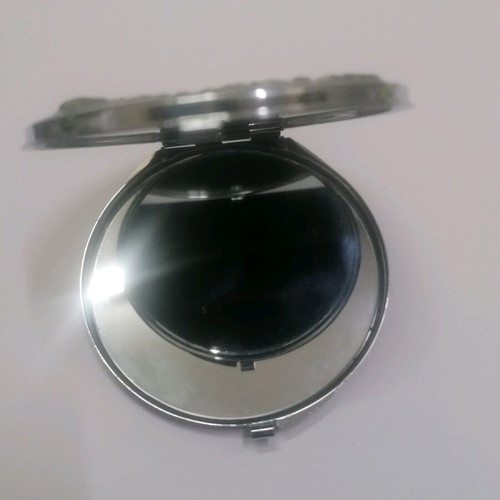 Double compact mirror new with magnifying side