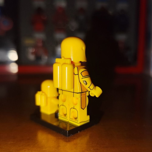 Yellow Astronaut figure with baby and stand, Lepin