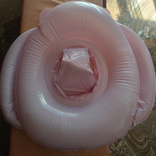 Baby float ring like new with built-in seat and steering wheel toy