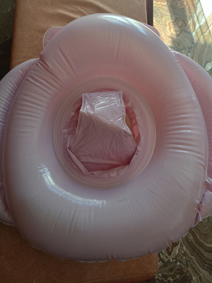 Baby float ring like new with built-in seat and steering wheel toy