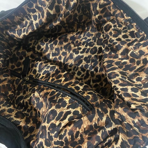 Victoria's Secret shoulder bag used with gold details and leopard inside