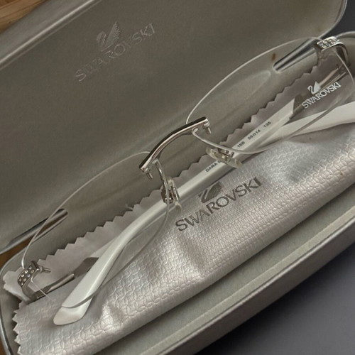 Swarovski women's eyeglasses new, white with crystals