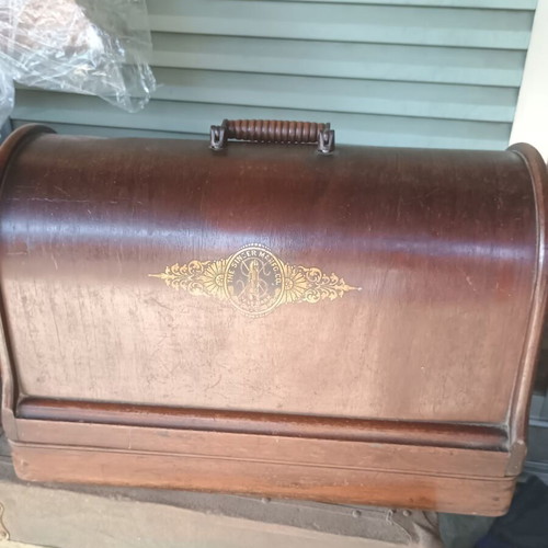 Singer portable sewing machine used, collectible