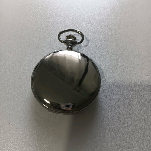 Collectible pocket watch like new in silver and gold tones