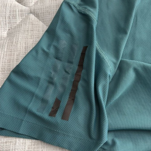 Adidas shirt used, turquoise, size M missing two stripes
