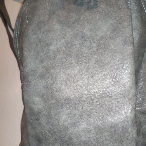 Backpack bag like new with two front hidden pockets gray