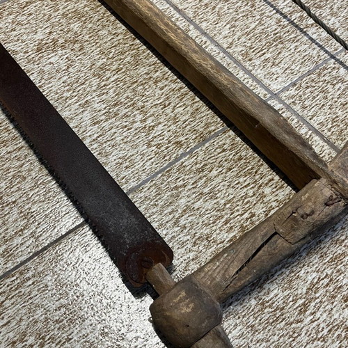 Old saw used from 1920-30 era museum piece