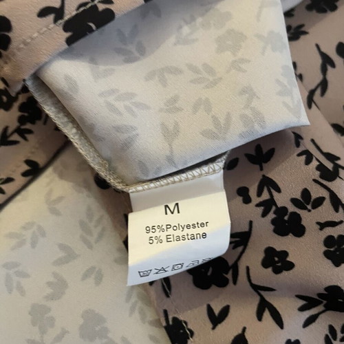 Women's blouse medium/large, beige with black floral pattern