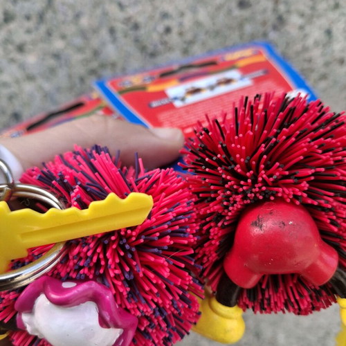 Set of 2 collectible Mickey and Minnie Koosh keyrings like new
